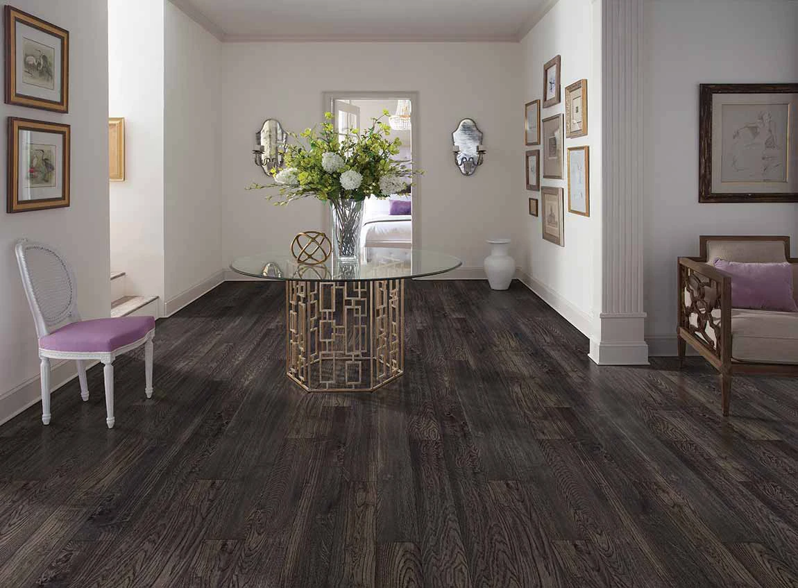 dark wood flooring in dining room
